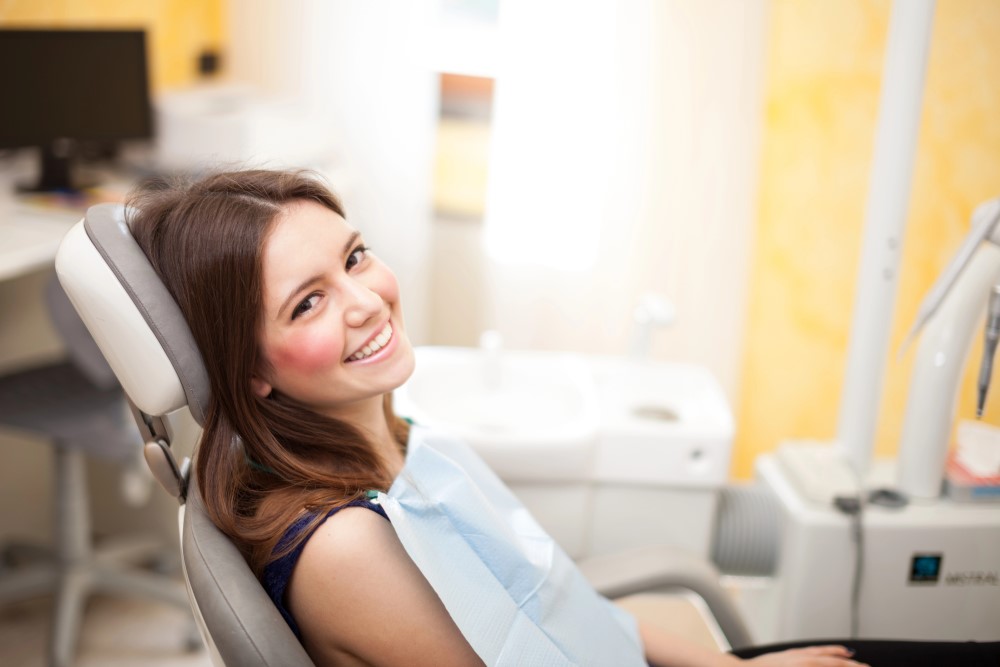 Kvinde ved tandplejen